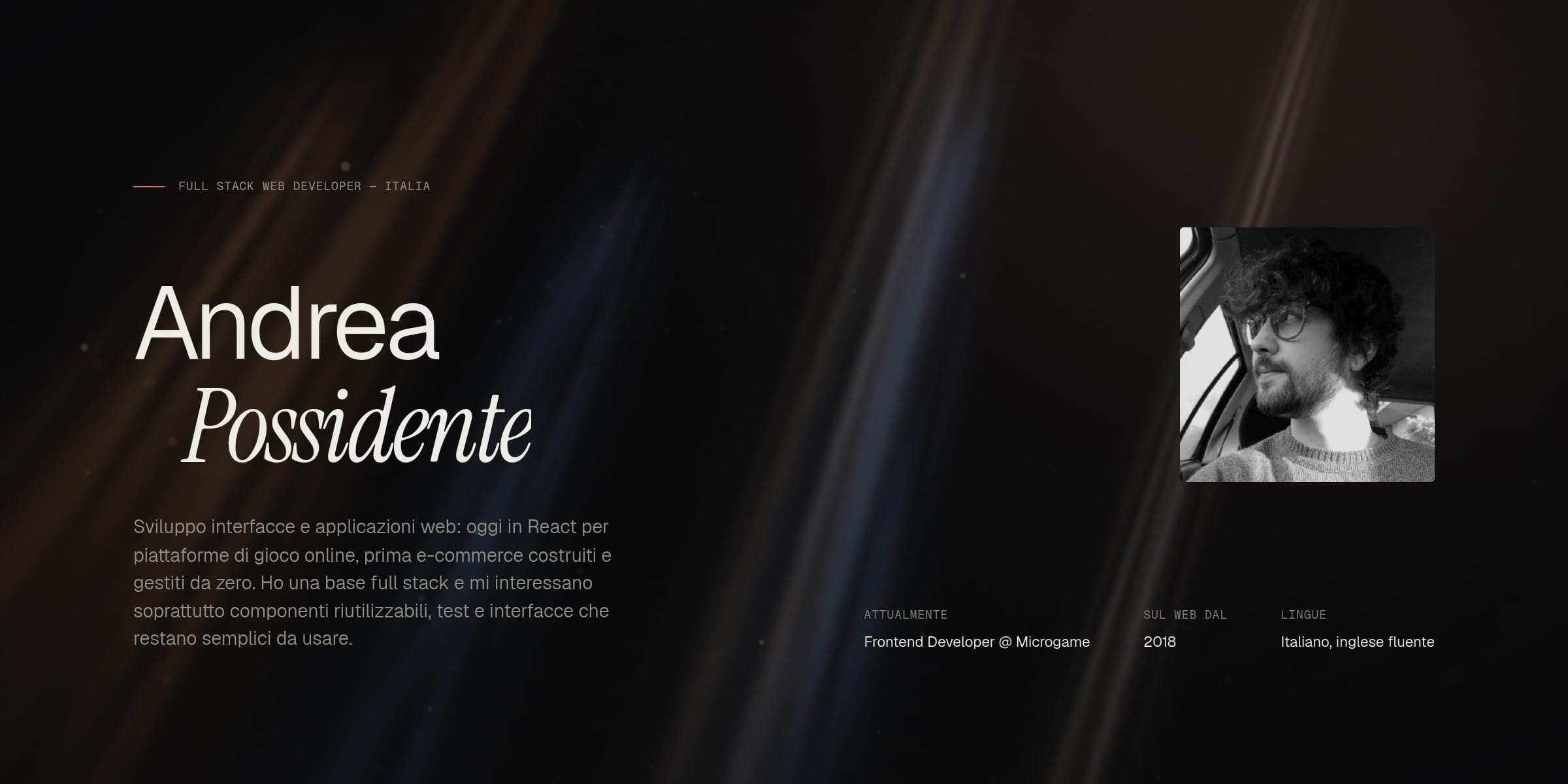 The portfolio hero: the name Andrea Possidente crossed by coloured beams of light, with the portrait on the right.
